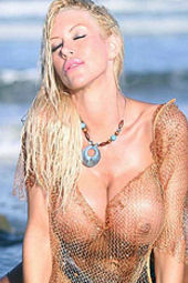 Tania Amazon Posing In Fishnet Top 