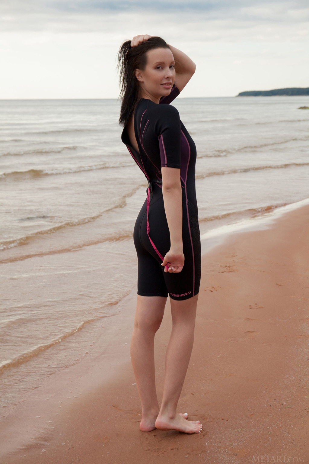 Raven-haired Agatha came down to the beach to surf the waves 02